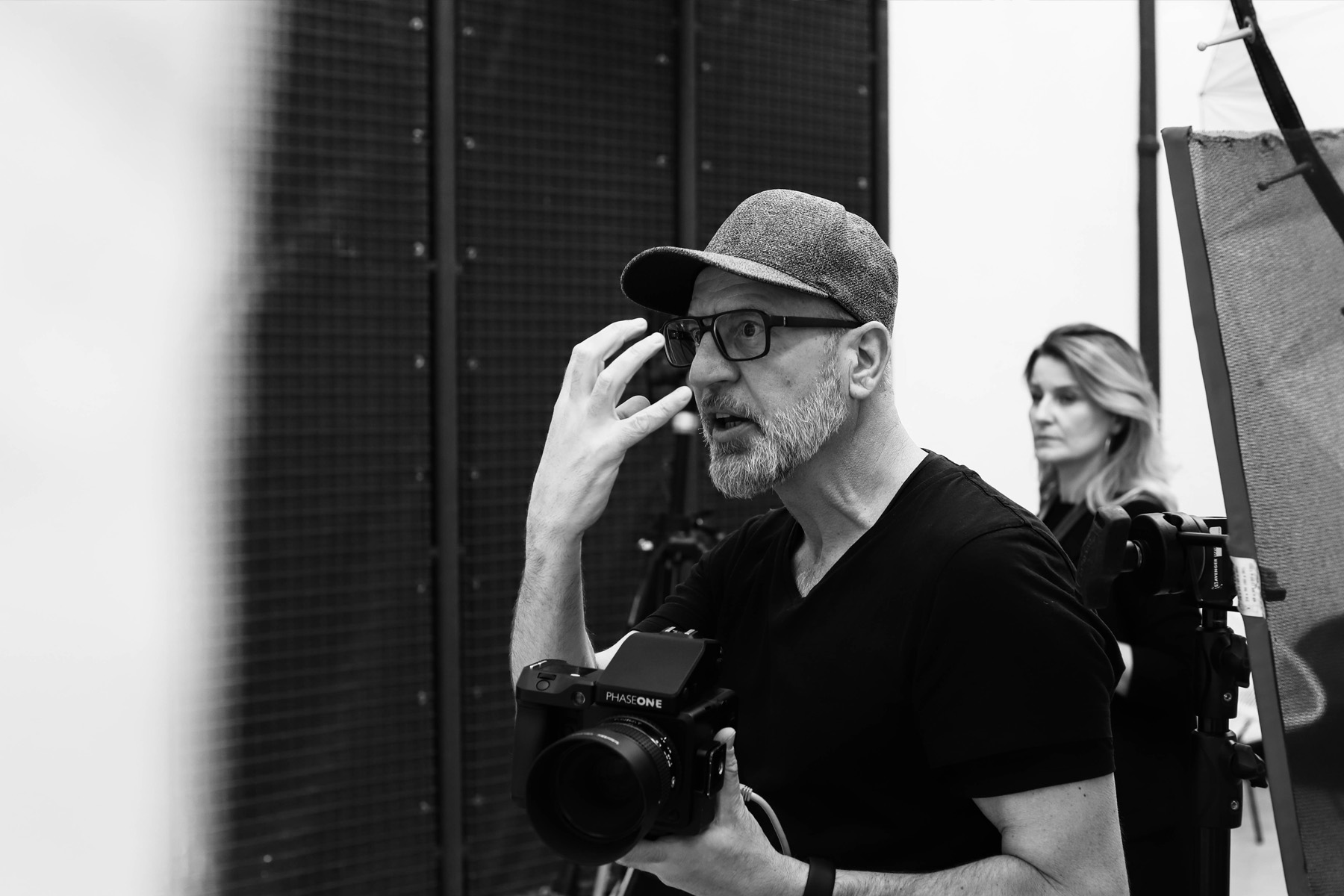 Werner Streitfelder gives model instructions for the shoot for Coopers AG